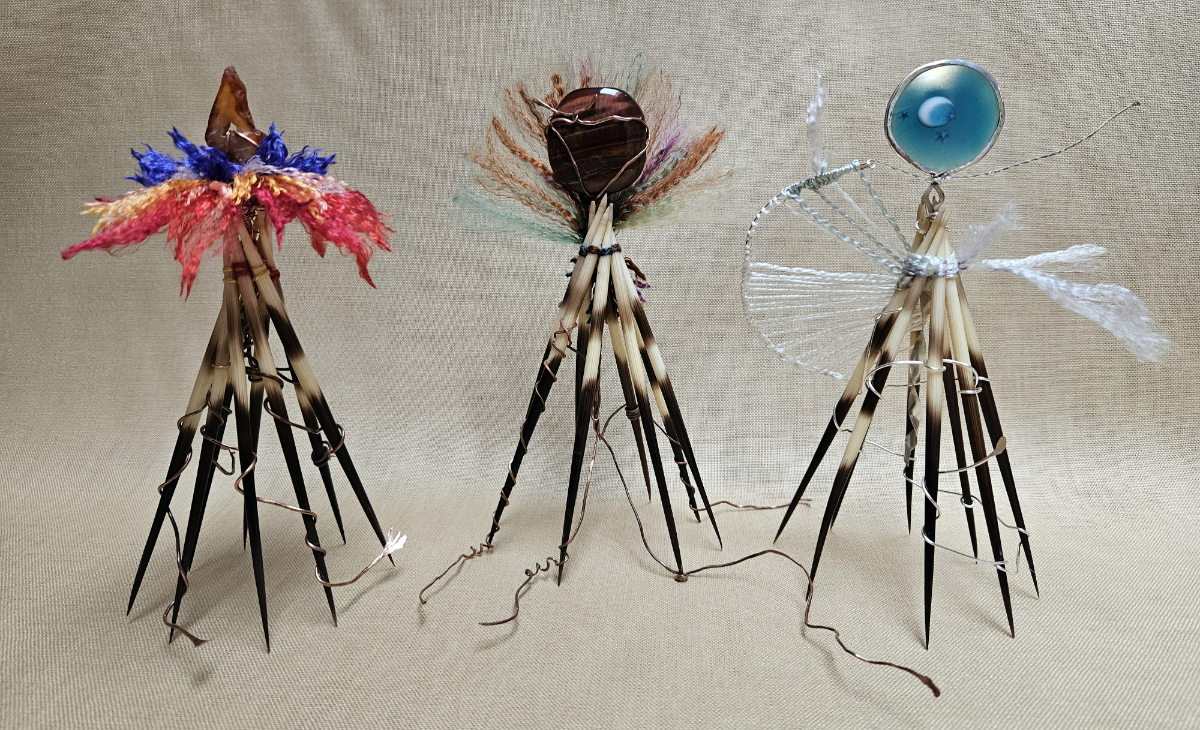 three scuptures with octopine quill legs and gem for a head